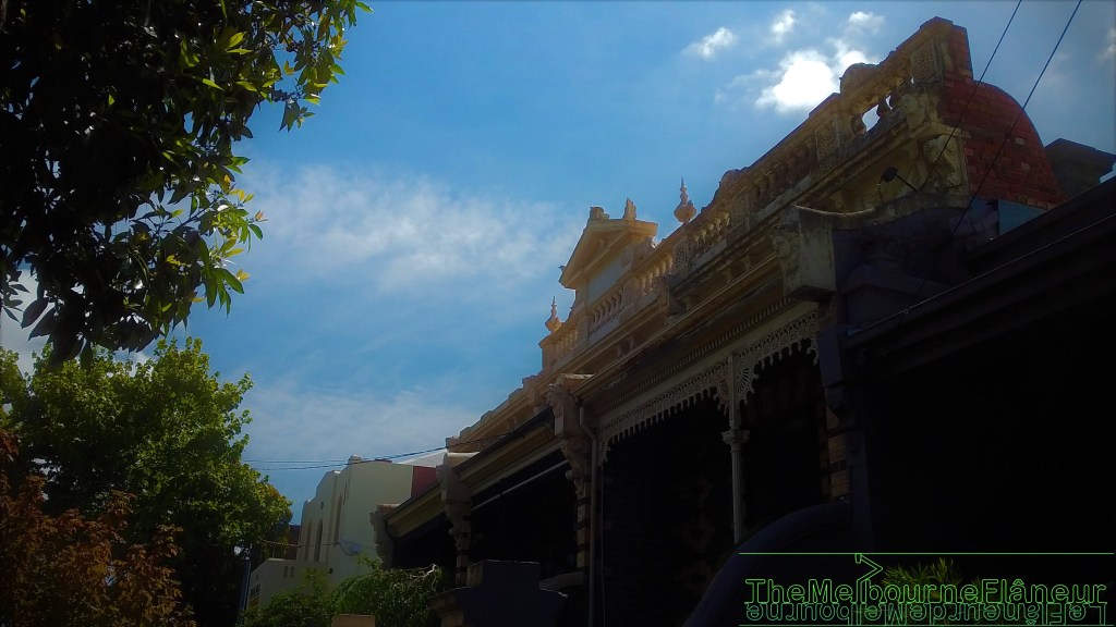 824-8 Lygon Street, Carlton North, a typical example of nineteenth-century Melburnian row architecture.  Beyond it, to the left, is the hall of the Società Isole Eolie Melbourne, an art déco gem dating from the period when Carlton was the Jewish, rather than Italian, enclave of Melbourne.  Photograph by Dean Kyte, the Melbourne Flâneur.